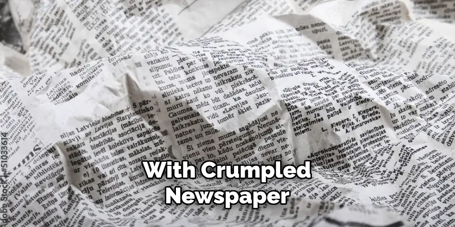 With Crumpled Newspaper 