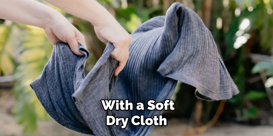 With a Soft, Dry Cloth 