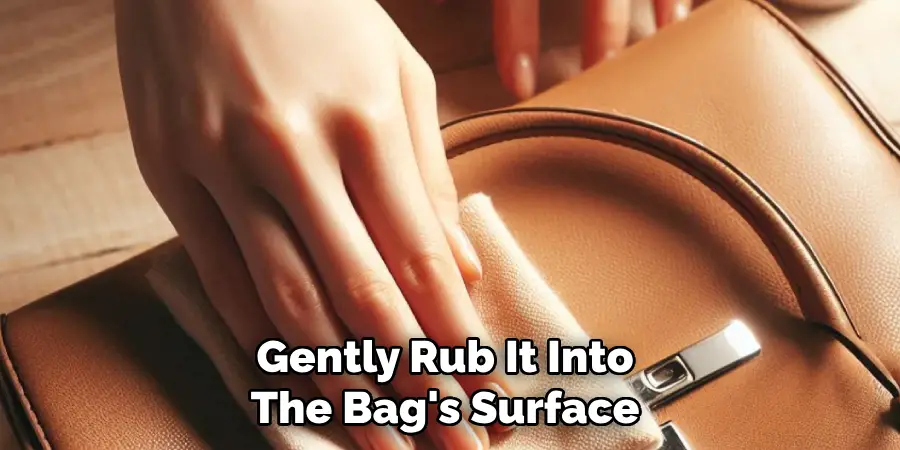 Gently Rub It Into 
The Bag's Surface 