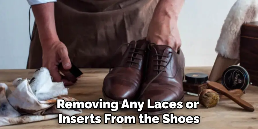 Removing Any Laces or 
Inserts From the Shoes