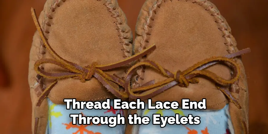 Thread Each Lace End Through the Eyelets