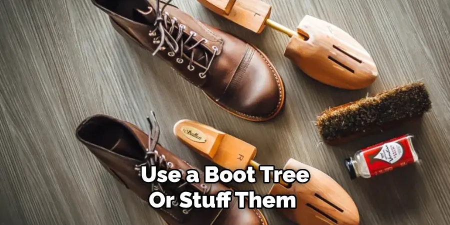 Use a Boot Tree 
Or Stuff Them  