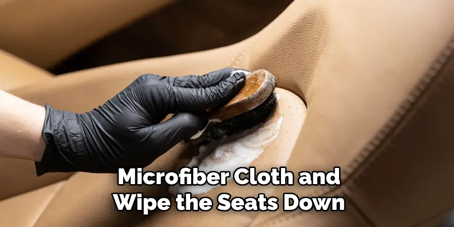Microfiber Cloth and Wipe the Seats Down
