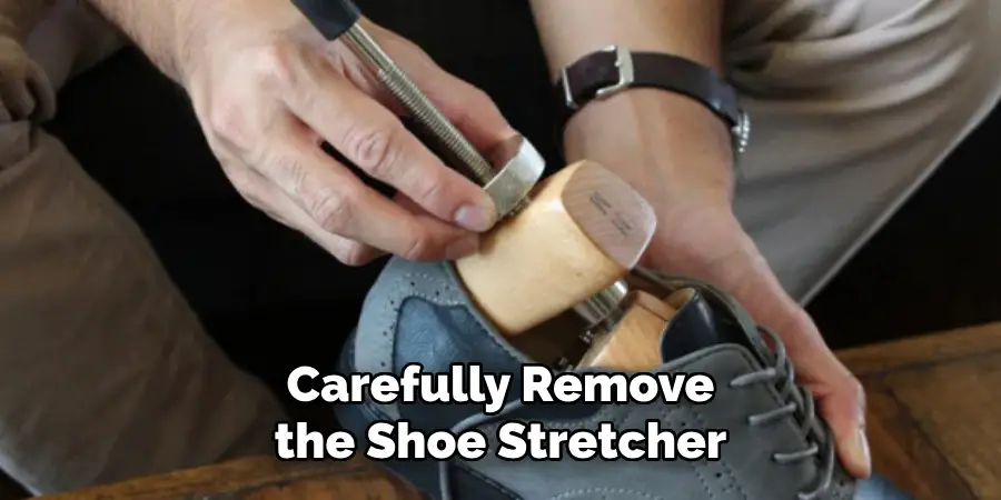 Carefully Remove the Shoe Stretcher