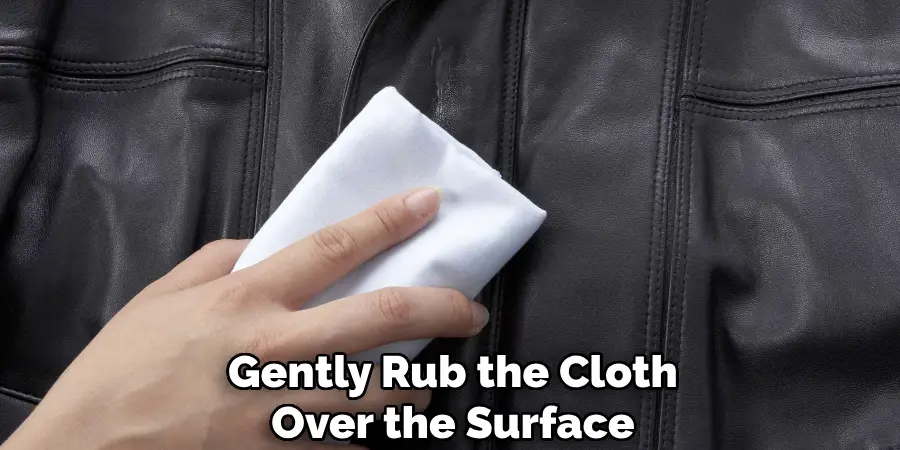 Gently Rub the Cloth
Over the Surface