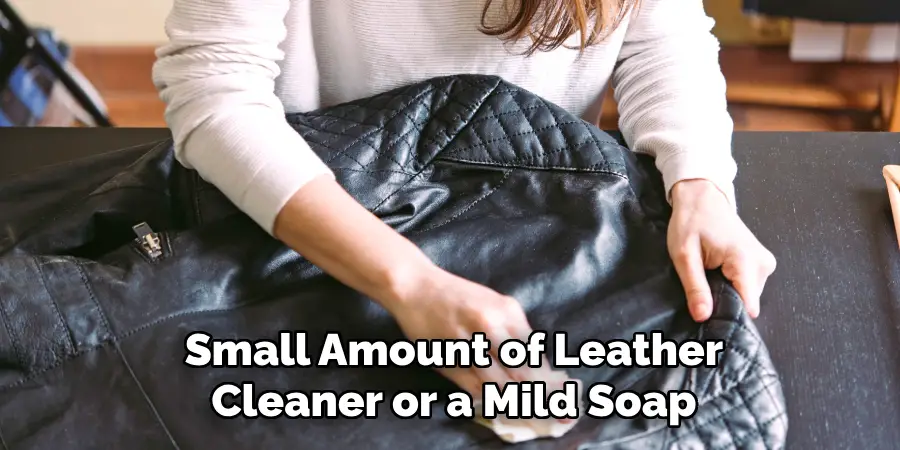 Small Amount of Leather Cleaner or a Mild Soap