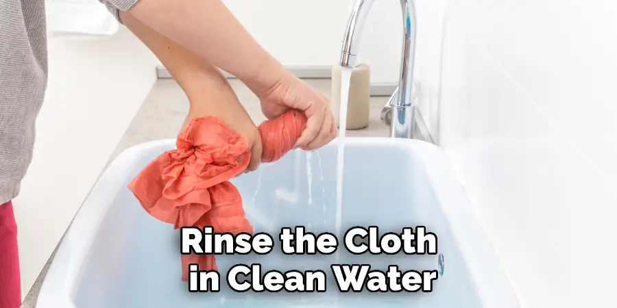 Rinse the Cloth in Clean Water