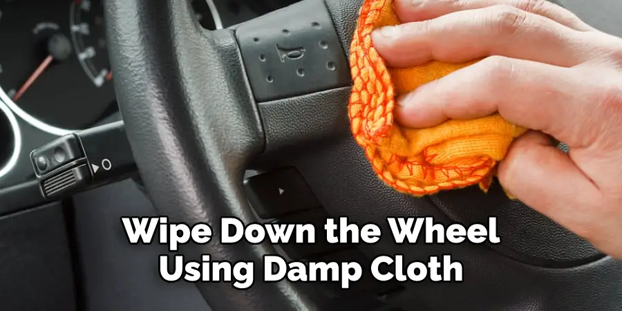 Wipe down the wheel using damp cloth