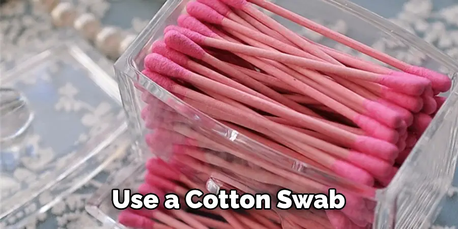 Use a Cotton Swab