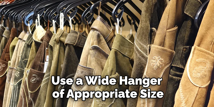 Use a Wide Hanger of Appropriate Size