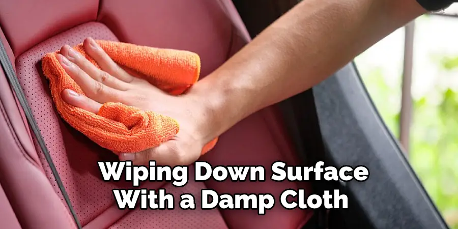  Wiping Down Surface
With a Damp Cloth