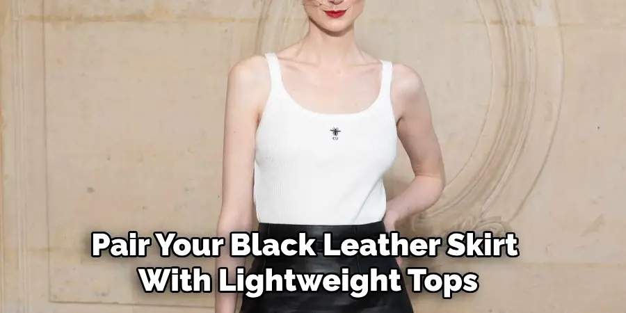 Pair Your Black Leather Skirt With Lightweight Tops