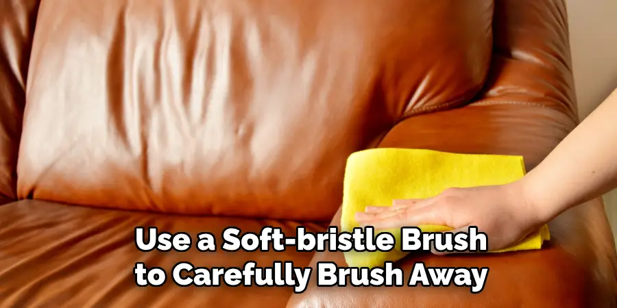 Use a Soft-bristle Brush to Carefully Brush Away